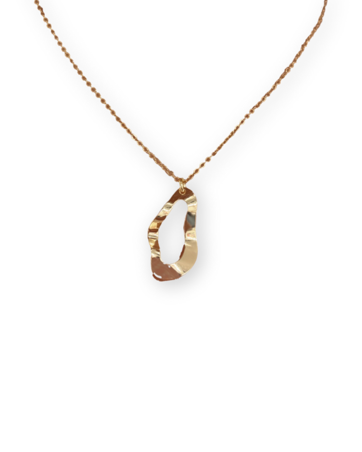 Gold filled necklace with a unique pendant on a white background